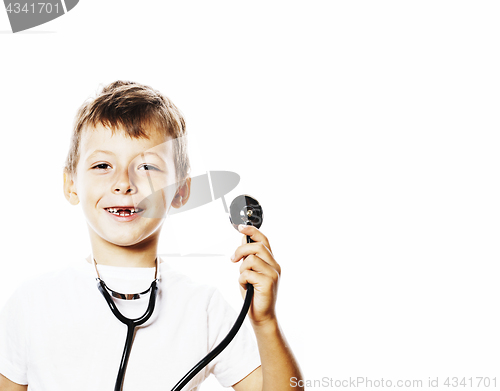 Image of little cute boy with stethoscope playing like adult profession d