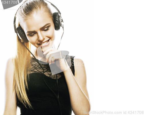 Image of young sweet talented teenage girl in headphones singing isolated