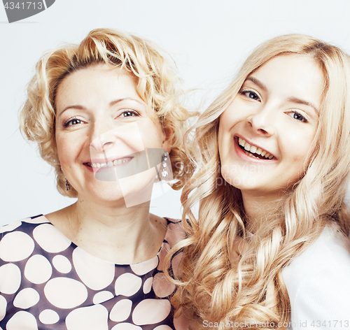 Image of mother with daughter together posing happy smiling isolated on white background with copyspace, lifestyle people concept 