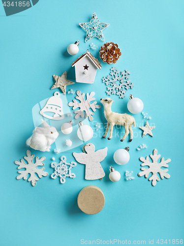 Image of various Christmas decorations on blue background