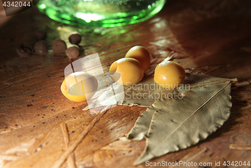 Image of green olives with other spices