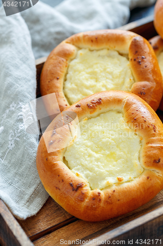 Image of Homemade pies with cottage cheese closeup.