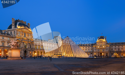 Image of View of famous Louvre Museum with Louvre Pyramid