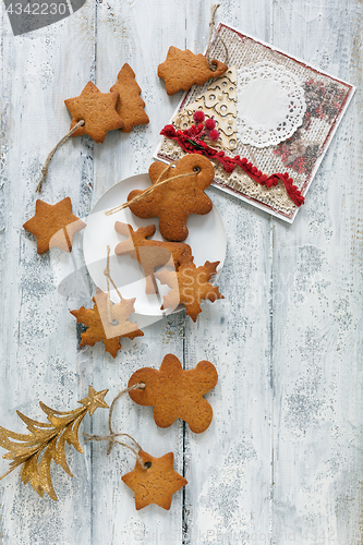 Image of Christmas cookies,tree and greeting card.