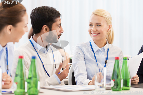 Image of happy business team at international conference