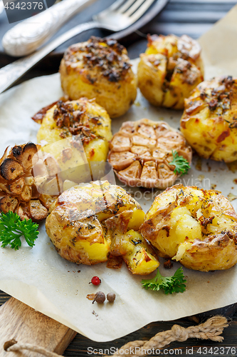 Image of Potatoes baked in their skins with spices.