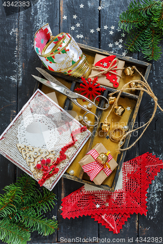 Image of Homemade Christmas gifts with tools and decorations.