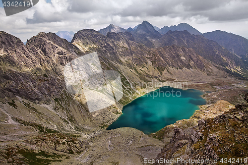 Image of Beautiful lake Hlincovo Pleso among rocky Tatra mountains