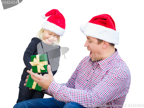 Image of Happy Young Girl and Father Wearing Santa Hats Opening Gift Box 