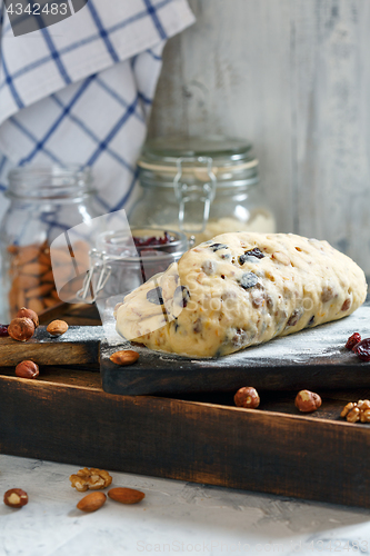 Image of Christmas Stollen on a floured Board.
