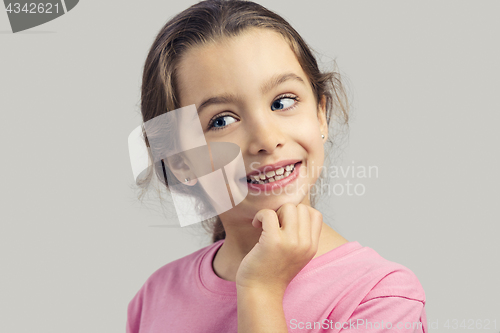Image of Little girl thinking