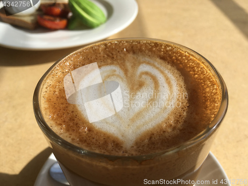 Image of Coffee latte served in a glass