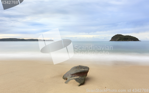 Image of Three rock forms in a landscape