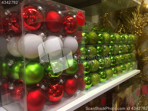 Image of Boxes of Christmas tree baubles ready for purchase