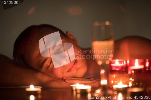 Image of man relaxing in the jacuzzi