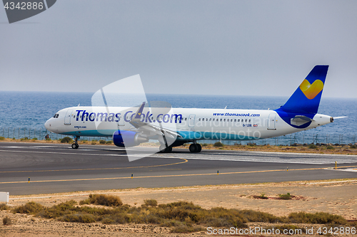 Image of ARECIFE, SPAIN - APRIL, 16 2017: AirBus A321 of ThomasCook.com w