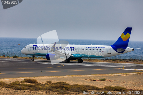 Image of ARECIFE, SPAIN - APRIL, 16 2017: AirBus A321 of ThomasCook.com w