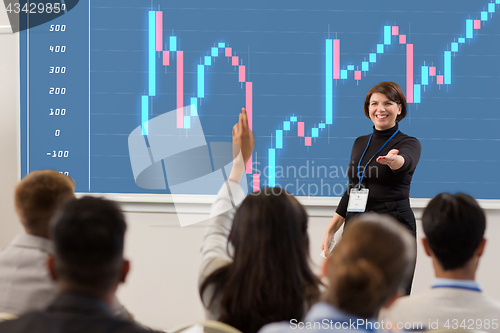 Image of group of people at business conference or lecture