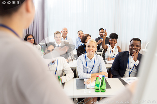 Image of group of people at business conference or lecture