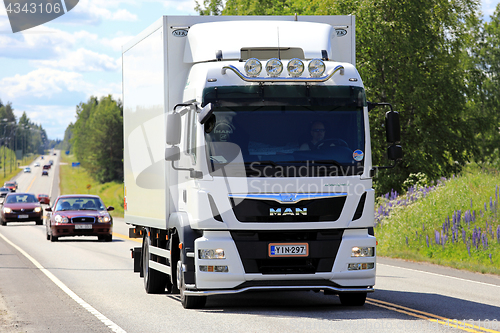 Image of White MAN TGM Delivery Truck on Summer Road