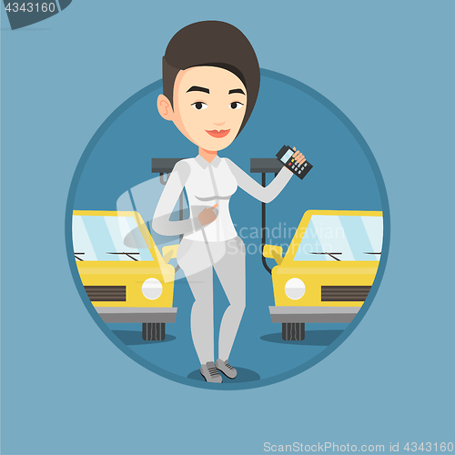 Image of Worker controlling automated assembly line for car