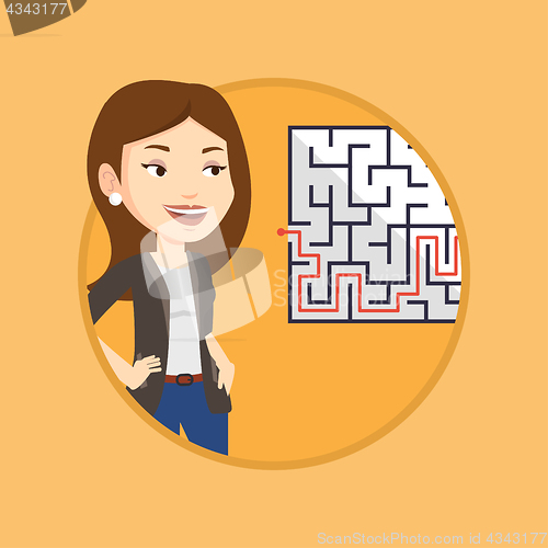 Image of Business woman looking at labyrinth with solution