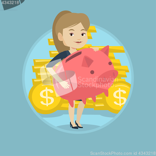 Image of Business woman holding big piggy bank.