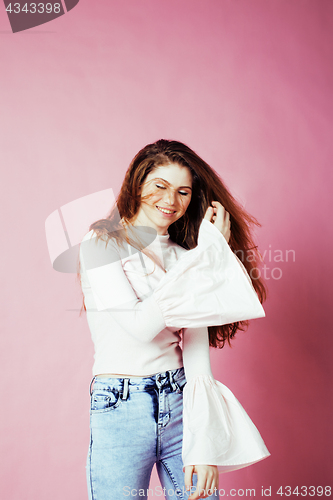 Image of cute pretty redhair teenage girl smiling cheerful on pink background, lifestyle modern people concept