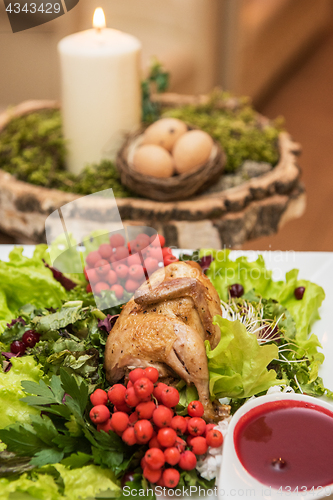 Image of quail roasted with sweet and sour cranberry sauce