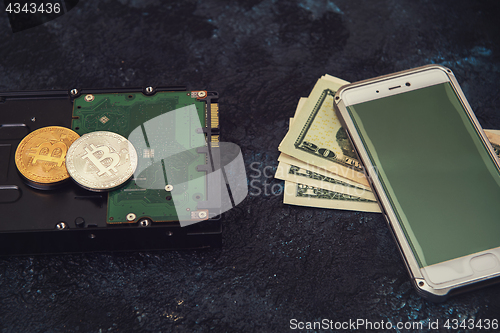 Image of Bitcoin coin with HDD