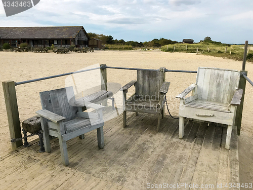 Image of Rustic Chairs at Beach Setting