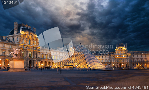 Image of View of famous Louvre Museum with Louvre Pyramid