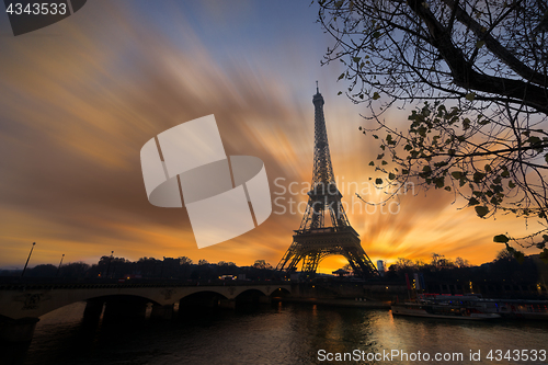 Image of The Eiffel tower at sunrise in Paris 