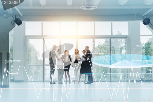 Image of business people with tablet pc computers at office