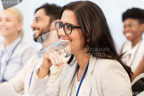 Image of happy business team at international conference