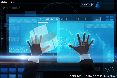 Image of close up of businessman hands with virtual screen