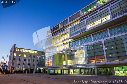 Image of Exterior of Slovenian Chamber of Commerce at dusk.