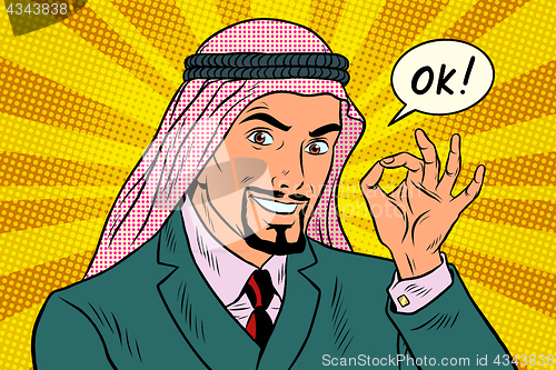 Image of OK gesture Arab businessman