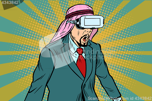 Image of Surprised Arab businessman in VR glasses