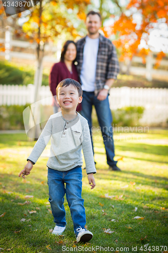 Image of Outdoor Portrait of Happy Mixed Race Chinese and Caucasian Paren