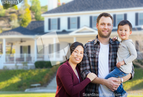 Image of Mixed Race Chinese and Caucasian Parents and Child In Front Yard