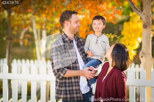 Image of Outdoor Portrait of Mixed Race Chinese and Caucasian Parents and