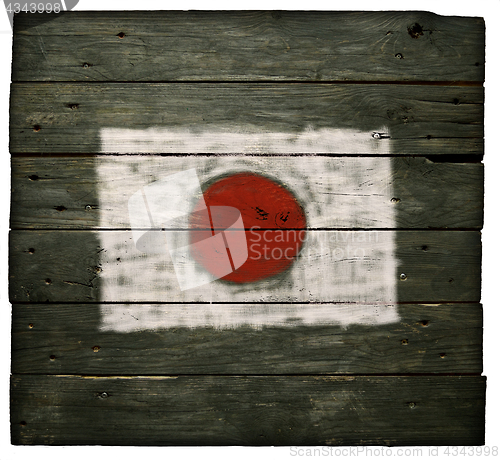 Image of flag of japan on wood