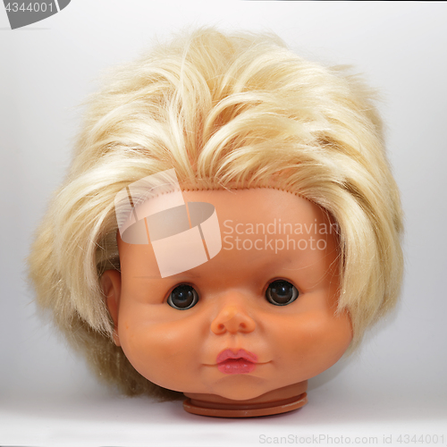 Image of head of a vintage doll