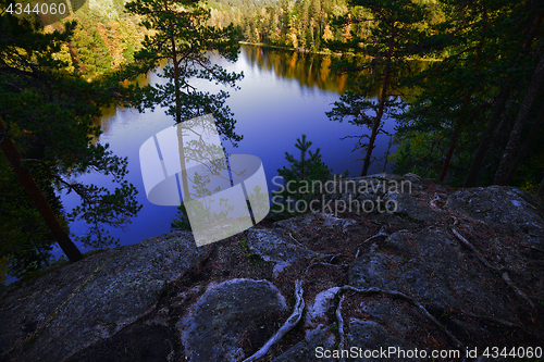 Image of view on a forest lake in autumn, Finland