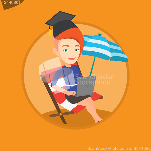 Image of Graduate lying in chaise lounge with laptop.