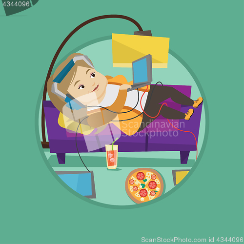 Image of Woman lying on sofa with many gadgets.