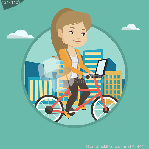 Image of Woman riding bicycle in the city.