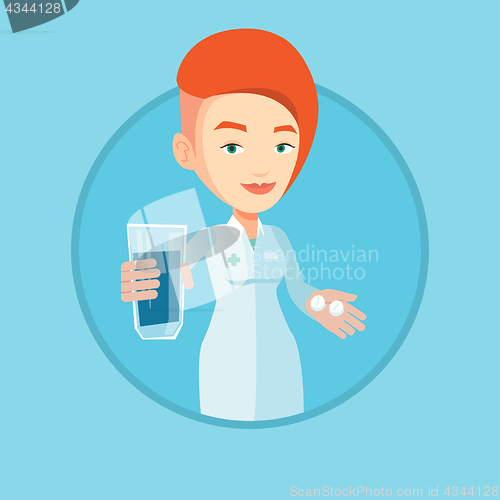 Image of Pharmacist giving pills and glass of water.