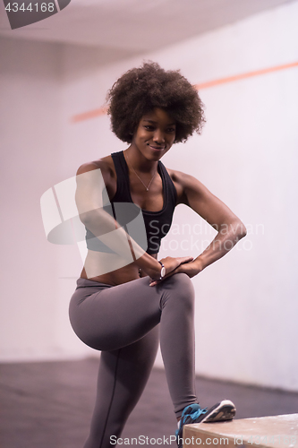 Image of black woman are preparing for box jumps at gym